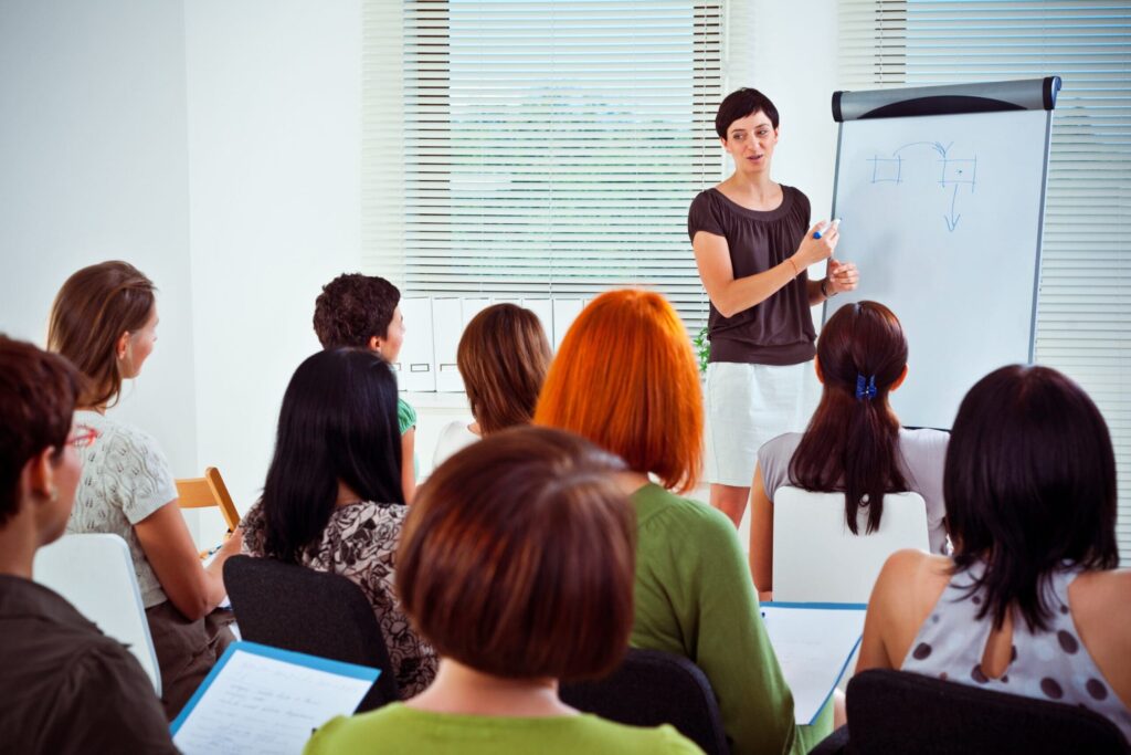 Woman training apprentices