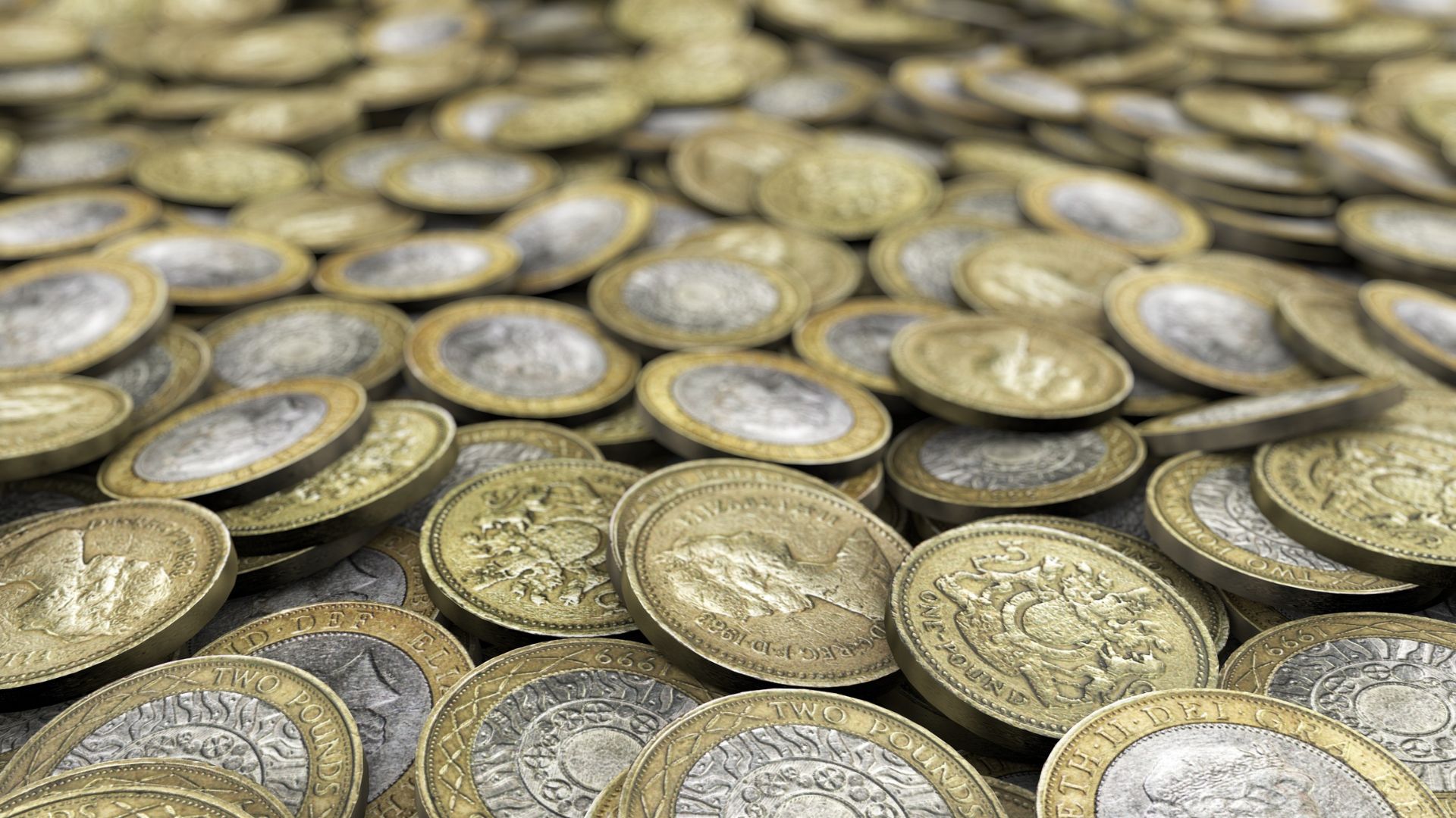 Pound coins in a pile