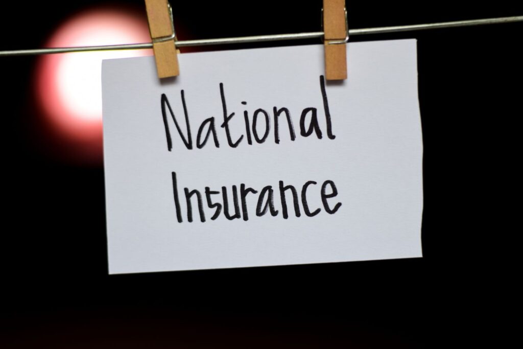 National Insurance sticker hanging up to dry on washing line