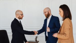 Corporate Responsibility and Sustainability Practitioner Level 4 Apprenticeship leading image of 3 men in smart wear